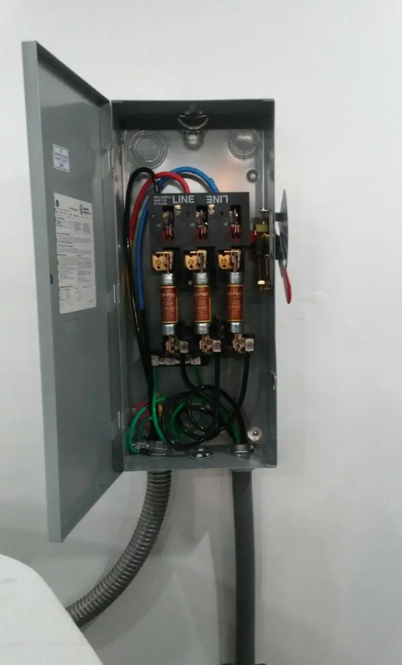 Three-phase disconnect switch installed for Smoke Detector Installation in Lawrence
